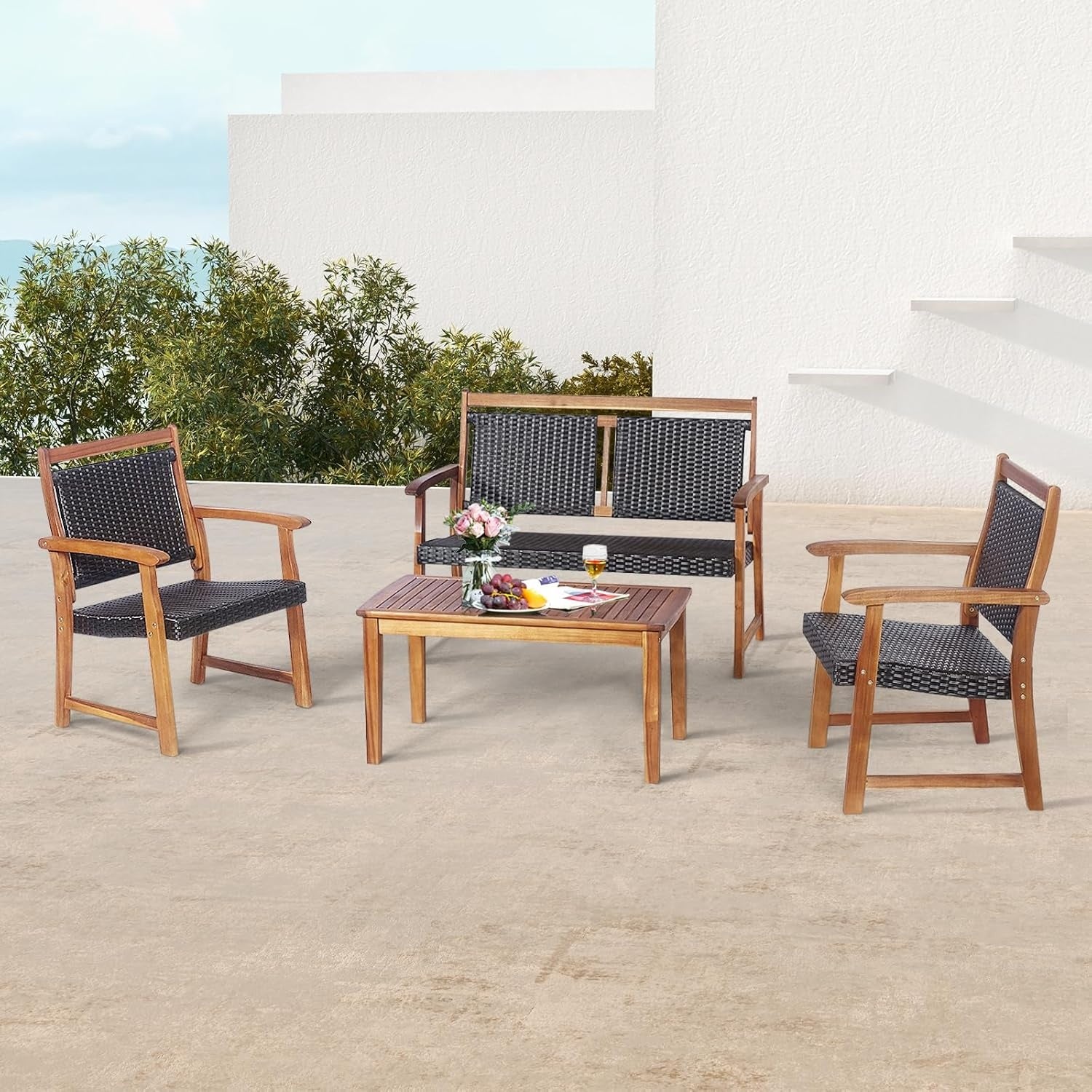 Salon de jardin quatre pi¨¨ces avec structure en bois d'acacia, assises ergonomiques et table assortie